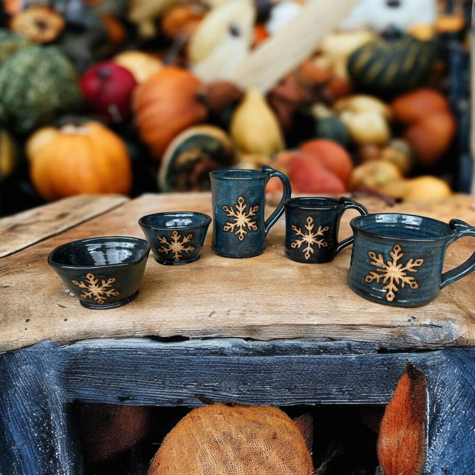 Blue stoneware displayed with pumpkins