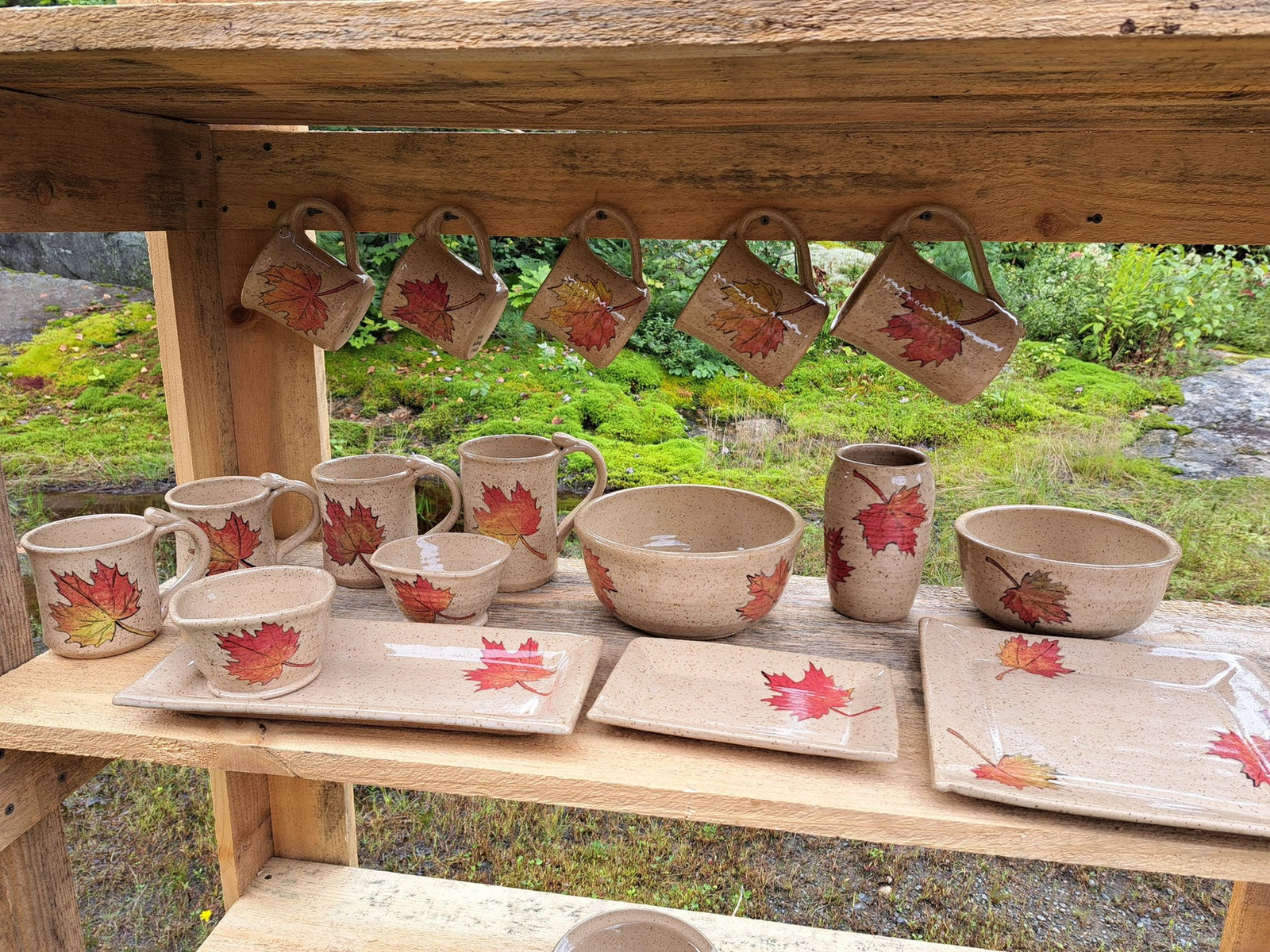 Pottery collection displayed outdoors